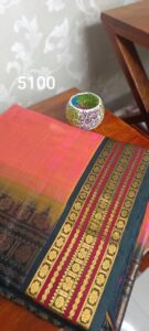 Sunset Bloom – Baby Pinkish Orange & Dark Green Kanjivaram Saree